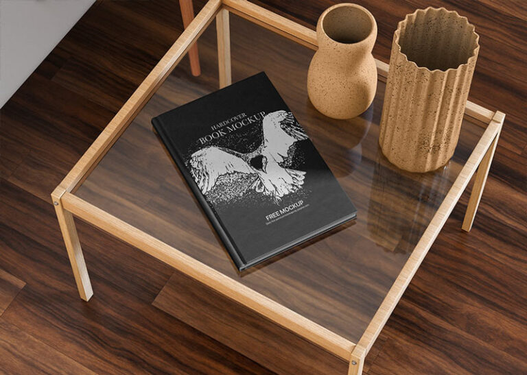 hardcover book on glass table mockup