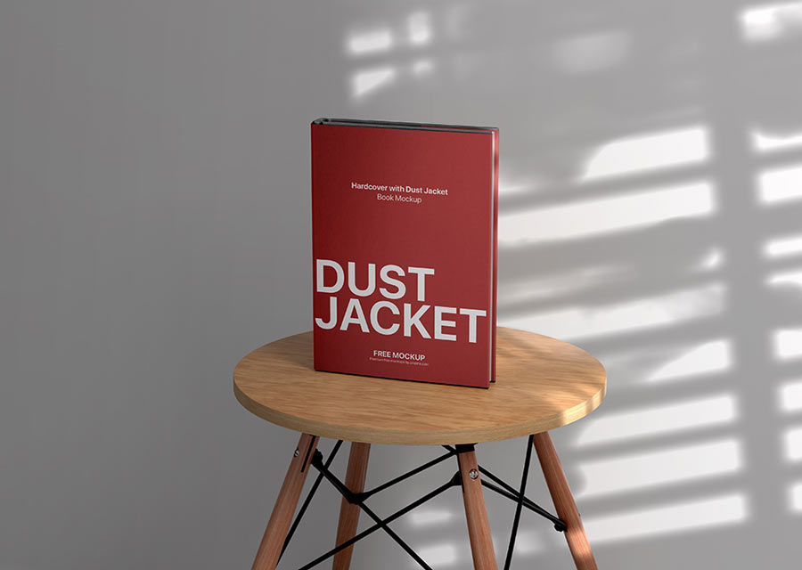 hardcover book on wooden table mockup